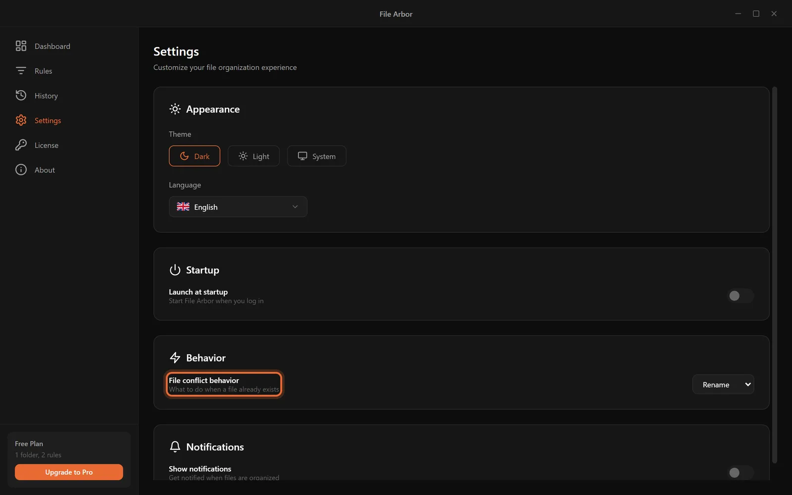 Settings 페이지. File conflict behavior 옵션이 강조되어 있다