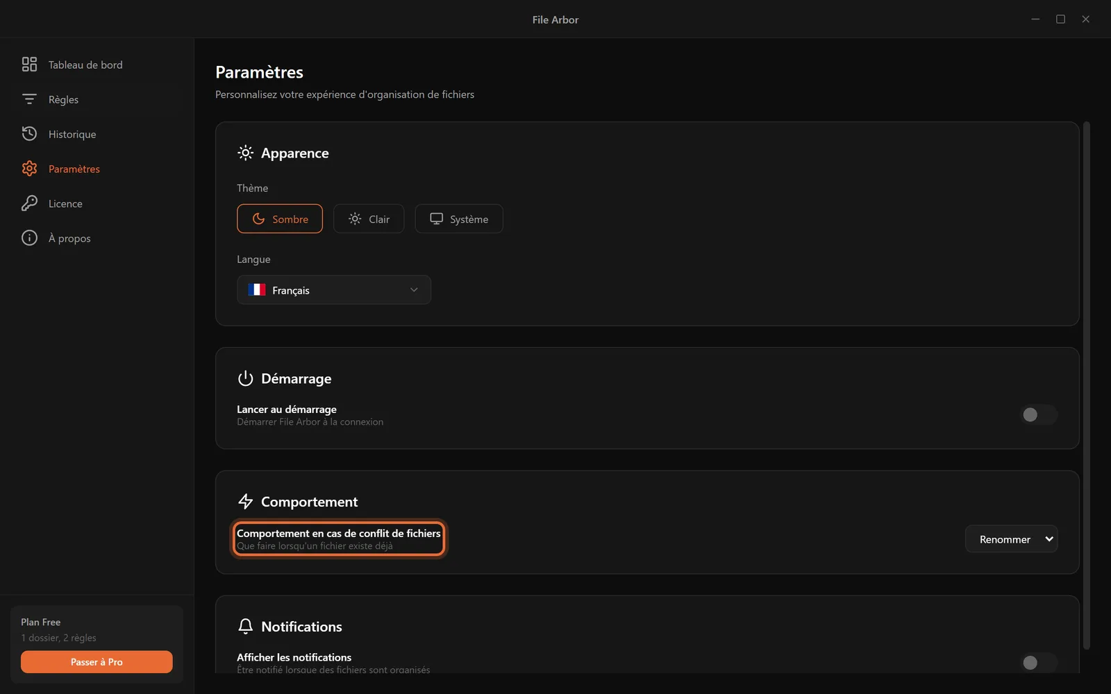 La page Paramètres avec l'option Comportement en cas de conflit de fichiers mise en évidence