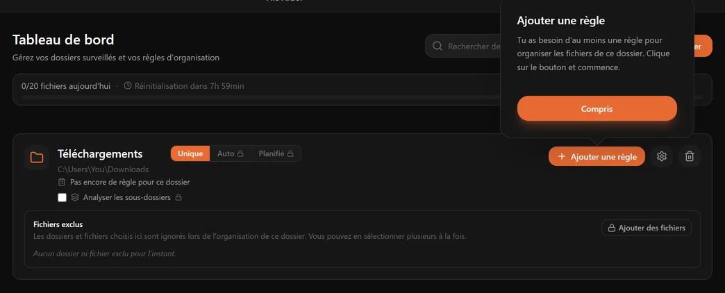 Une carte de dossier Téléchargements fraîchement ajoutée, avec une bulle qui pointe le bouton Ajouter une règle