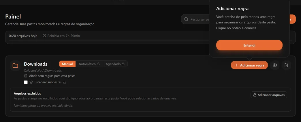 Um cartão de pasta Downloads recém-adicionado, com um aviso apontando para o botão Adicionar regra